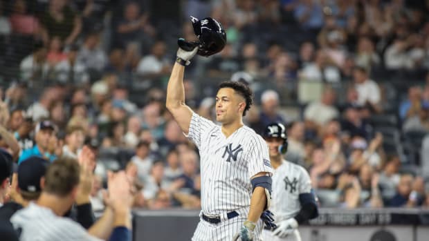 Sep 5, 2023; Bronx, New York, USA; New York Yankees designated hitter Giancarlo Stanton (27) gives the fans a curtain call after hitting a two run home run in the sixth inning for his 400th career home run against the Detroit Tigers at Yankee Stadium.